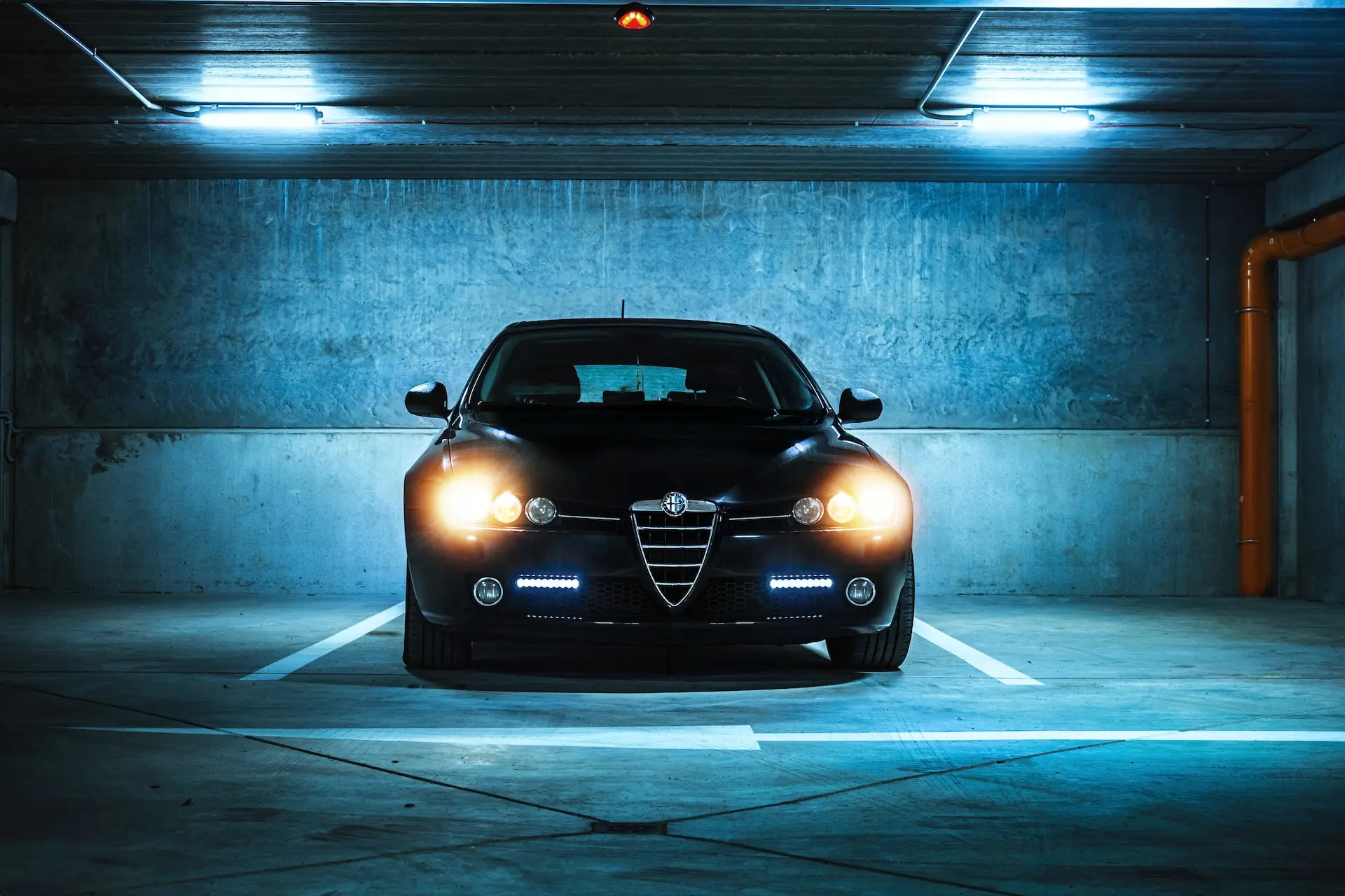 alfa romeo in a parking lot