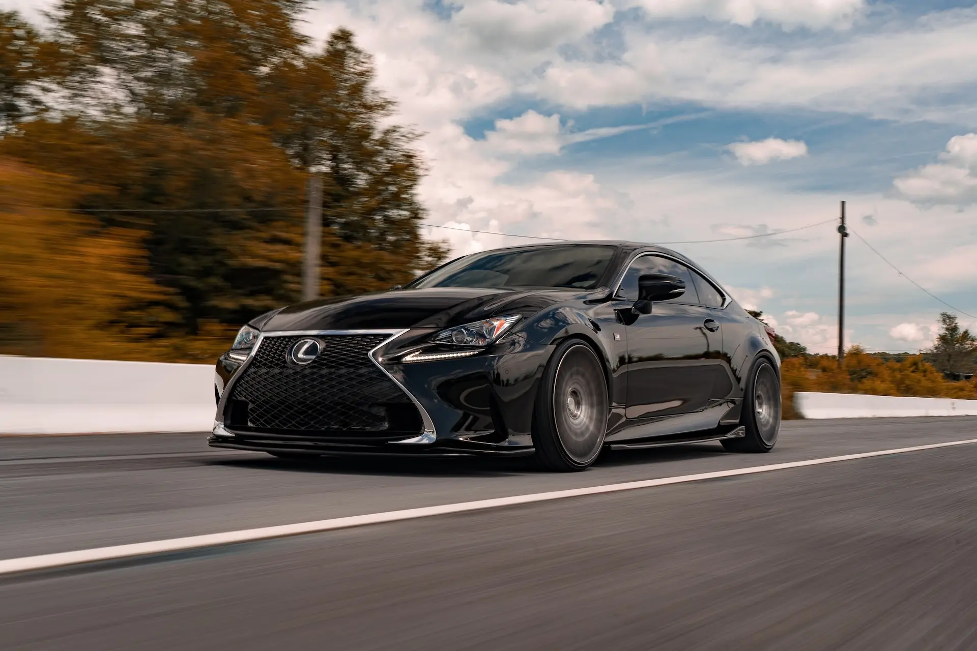 black lexus on road