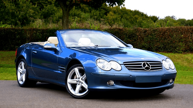 blue car parked on road