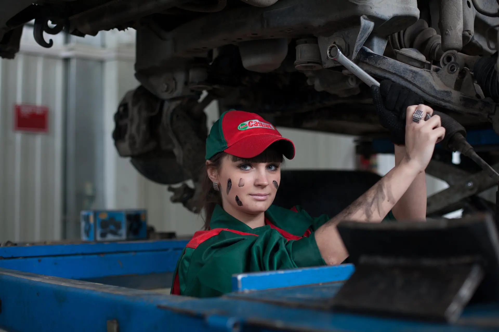 woman-holding-gray-steel-wrench